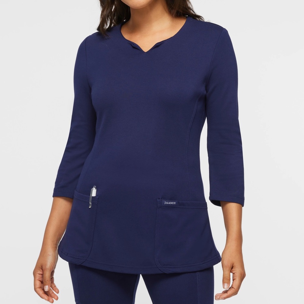 Two 3/4 sleeve Jaanuu Scrub Tops. Size M.